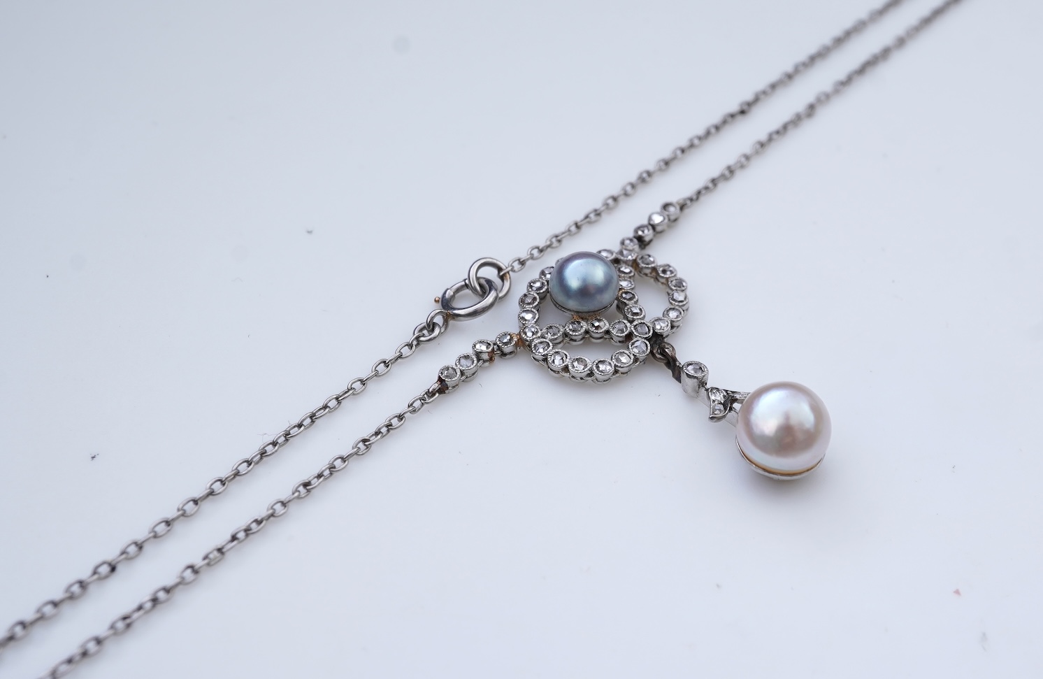 A Belle Epoque pearl and diamond pendant, early 20th century